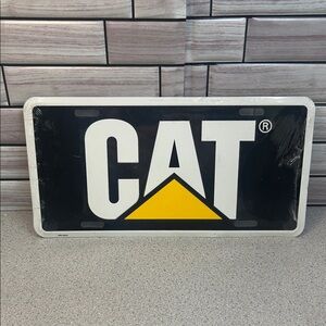 New CAT Caterpillar Black and Yellow License Plate Sealed